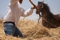 The farmer fanning wheat separating the wheat from the chaff Royalty Free Stock Photo