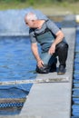 Farmer at a fishfarm