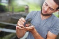 Farmer on frog farm in Bali Royalty Free Stock Photo
