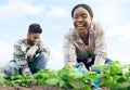 Farmer, gardening and agriculture portrait in field with happy black woman and indian man working. Nature, soil and Royalty Free Stock Photo