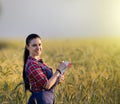 Farmer girl in barley field