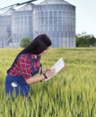 Farmer girl in barley field