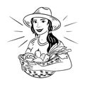 Farmer girl with a basket of vegetables and fruits in her hands Royalty Free Stock Photo