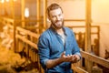 Farmer at the goat barn