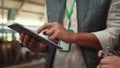 Farmer hands holding tablet computer closeup. Specialists discussing data in pad Royalty Free Stock Photo