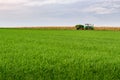 Farmer harvesting grass