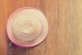 Farmer hat on table with vintage tone copy space. Royalty Free Stock Photo