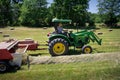 Farmer Haying Field