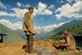 Farmer and his Wife cleaning Rajgira or Amaranth grain upper Bharmour district Chamba Himachal Pradesh