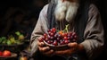 Farmer holding a bunch of grapes