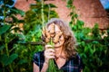 farmer holding fresh bunch of carrots in garden organic farming concept Royalty Free Stock Photo