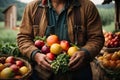 farmer holding in hand vegitables and fruits Royalty Free Stock Photo