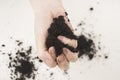 A pile of soil in female hands Royalty Free Stock Photo