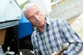 Farmer holding tractor pto shaft Royalty Free Stock Photo
