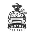 Farmer holding wooden box with vegetables. Agriculture, farming logo or badge. Healthy organic natural farm food, emblem