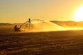 Farmer Irrigating Crops Using Pivot Irrigation System. Generative AI Royalty Free Stock Photo