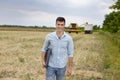 Farmer with laptop in the field