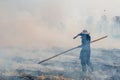 Farmer lighting thailand controlled prairie field burning Royalty Free Stock Photo