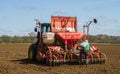 Farmer loading up seed drill ready for drilling Royalty Free Stock Photo