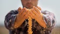 Farmer looking at corn grains in tractor trailer