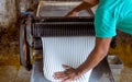 Farmer making rubber sheets hang on bamboo process dry by solar energy . A raw rubber latex flat to dry. Rubber sheet is a raw ma