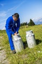 Farmer with milk containers Royalty Free Stock Photo