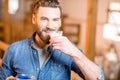 Farmer with milk at the goat barn Royalty Free Stock Photo