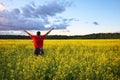 Farmer with outstretched arm at the field. Royalty Free Stock Photo