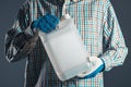 Farmer with plastic tenk canister with pesticides Royalty Free Stock Photo