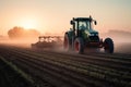 Farmer Plowing Field on Hazy Morning