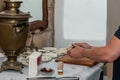 The farmer prepares goat cheese for tasting in the home kitchen. Farm home-cooked food Royalty Free Stock Photo