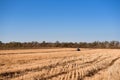 Farmer preparing his field in a tractor ready for spring. Royalty Free Stock Photo