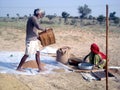 Farmer of Rajasthan doing various agricultural work in his field with his wife