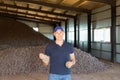 Farmer showing freshly potatoes