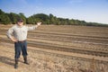 Farmer showing his farming land