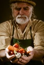 Farmer shows his biological vegetables