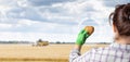 Farmer shows a potato in the form of a heart