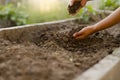 Farmer and soil at garden