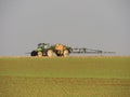 Farmer spraying chemicals in the fields