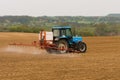 A farmer spraying with a Landini Evolution 9880 tractor. Royalty Free Stock Photo