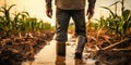 Farmer standing in a flooded cornfield, reflecting on climate change\'s impact on agriculture Royalty Free Stock Photo