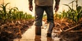 Farmer standing in a flooded cornfield reflecting on climate changes impact on agriculture food security and rural economy Royalty Free Stock Photo