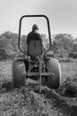 Farmer Tilling Field Harvesting Potatoes Royalty Free Stock Photo