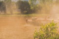 Farmer tractor with disc harrow system working on a stubble field Royalty Free Stock Photo