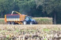 Farmer on tractor harvesting corn Royalty Free Stock Photo