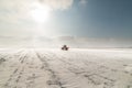 Farmer with tractor seeding - sowing crops at agricultural field Royalty Free Stock Photo