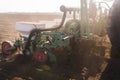 Farmer with tractor seeding - sowing soy crops at agricultural f Royalty Free Stock Photo