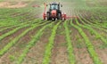 Farmer with tractor seeding soy crops at agricultural field Royalty Free Stock Photo