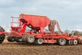 Farmer tractor working in the field. Spring time for sowing Royalty Free Stock Photo