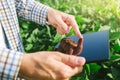 Farmer using digital tablet computer in cultivated soybean crops Royalty Free Stock Photo